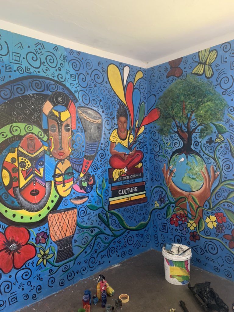 slbritish's tweet photo. Completing the final touches to our fabulous new mural by the incredibly talented Aminata from @KonaforMedia (spot the infamous Cotton Tree too!) #CultureConnectsUs #SierraLeone https://t.co/ij4UCFsdnd