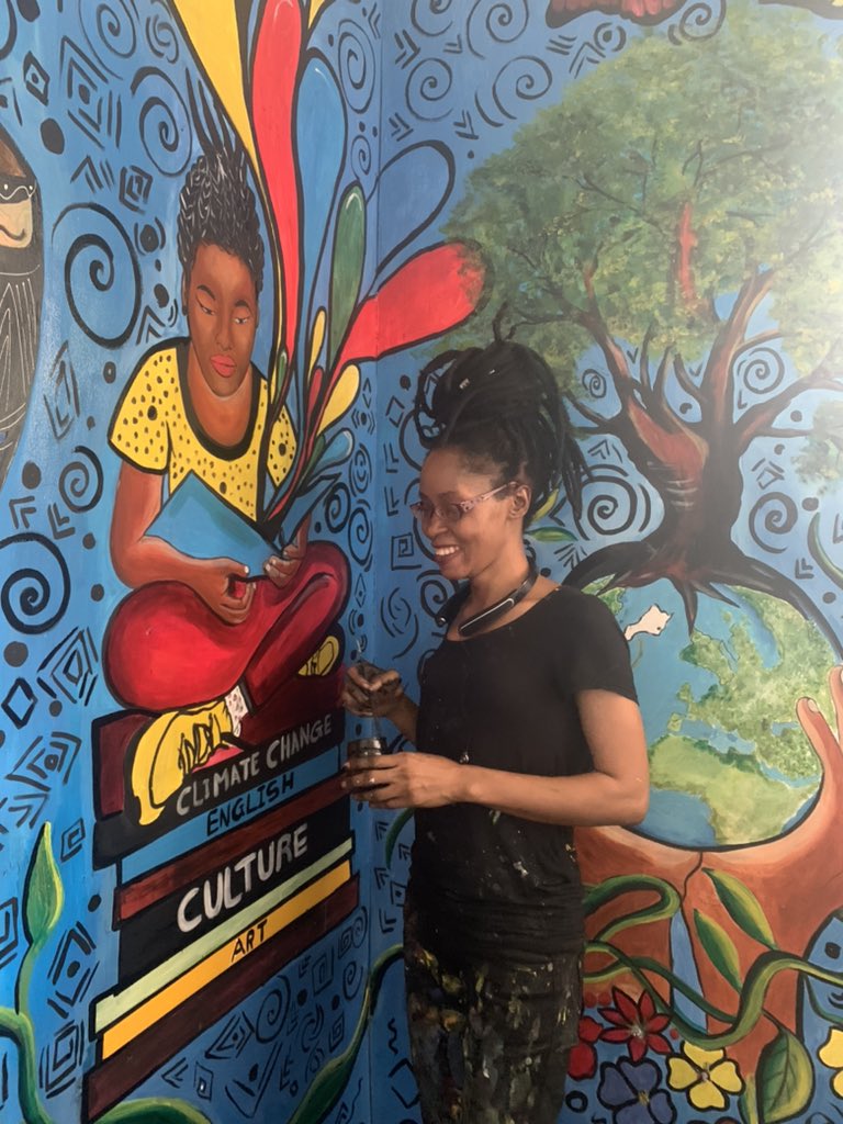 slbritish's tweet photo. Completing the final touches to our fabulous new mural by the incredibly talented Aminata from @KonaforMedia (spot the infamous Cotton Tree too!) #CultureConnectsUs #SierraLeone https://t.co/ij4UCFsdnd