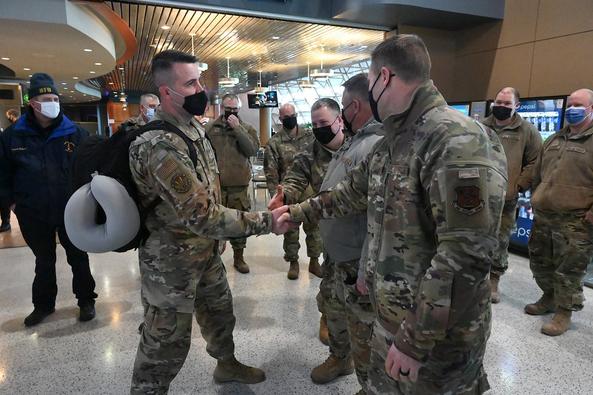 NDNationalGuard's tweet photo. #HappyHooligans continue to trickle home from their reserve component period 6 locations. CMSgt Kristi Erickson, TSgt Joseph Solberg, TSgt Michael McLaughlin, TSgt Casey Seitz, and SSgt Erik Hest returned to Hector International Airport. Welcome home Airmen! #NationalGuard https://t.co/Qn8ZzRPhZ3