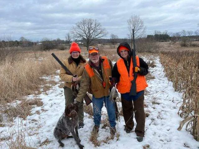 SixRivers's tweet photo. On Wednesday, Radar, the Official Hunting Mascot of Six Rivers,  took Executive Director Chris Bunch, President Amy O'Leary, and Secretary Andrea LaFontaine on a pheasant hunt at Hunters Creek in Metamora so they could discuss land conservation, trails, and parks. A great day! https://t.co/RmuX0qvvS2