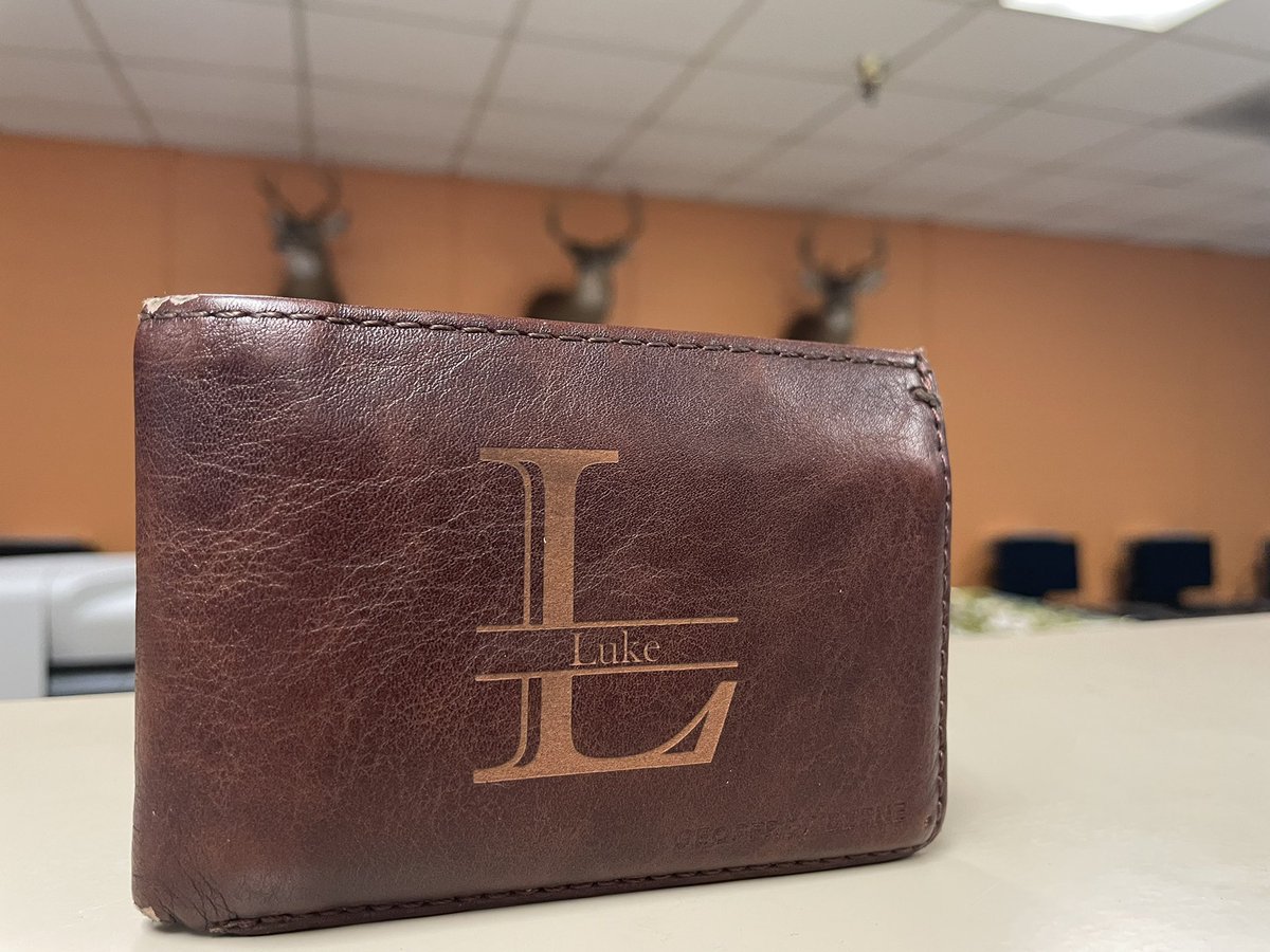 We engraved this wallet look at the big bucks hanging out of it. <a href="/laser_dc/">DC Laser Design</a>