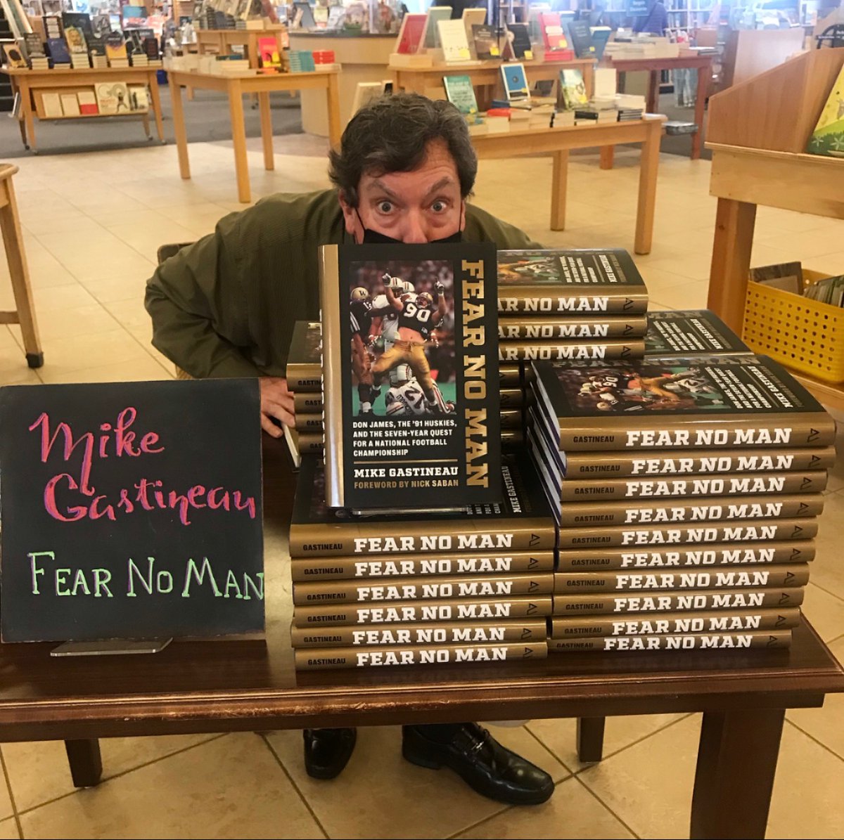 grace_rajendran's tweet photo. I took this fun photo of @gasman206 when he stopped by to sign our new batch of FEAR NO MAN stock @ubookstoresea ! Still a bestseller for us! 💗📚 @UWAPress https://t.co/dXVcJaU6Ew
