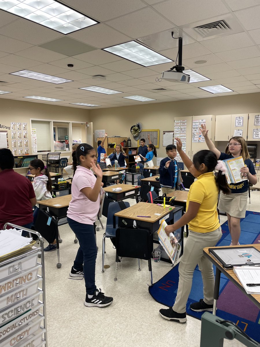 Stand Up, Hand Up, Pair Up ~~ Definitely one of our favorite Kagan Strategies! Today we shared about our own Culture with classmates! We learned so much about each other! #kagan #collierschools #poincianaelementary