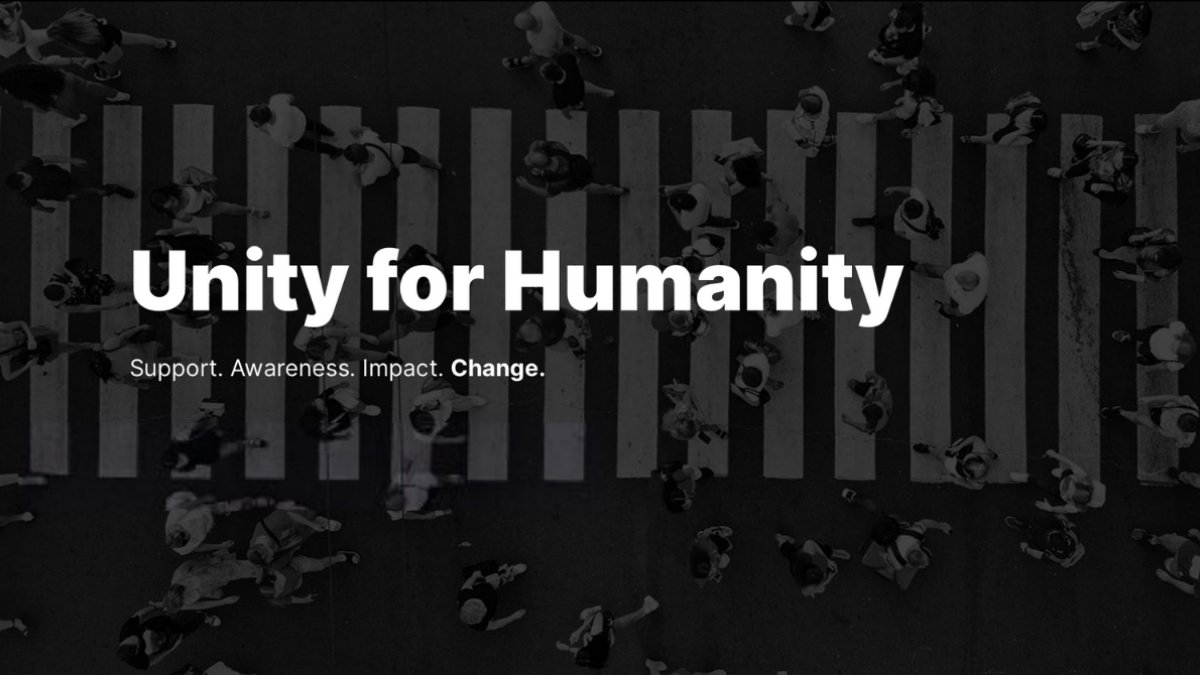 Dark image of people walking through a crosswalk, with the words, "Unity for Humanity" and "Support. Awareness. Impact. Change" overlaid.