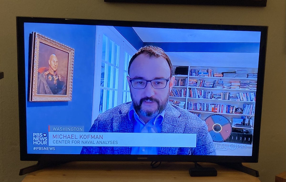 WilliamTroop's tweet photo. Love the painting @KofmanMichael  but is that a tribute to @SirPatStew or #CaptainPicard? 

cc @pbsnewshour https://t.co/lcl6h0qC9r