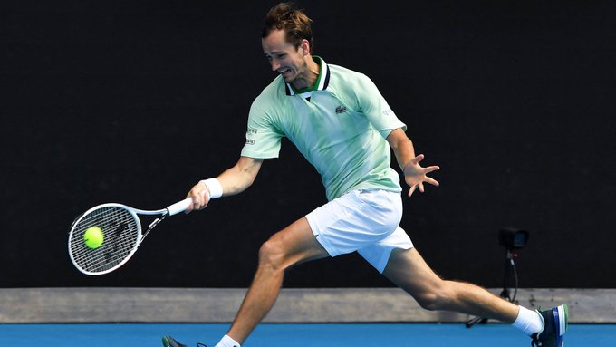 Daniil Medvedev plays a forehand in his third-round match at the 2022 Australian Open.