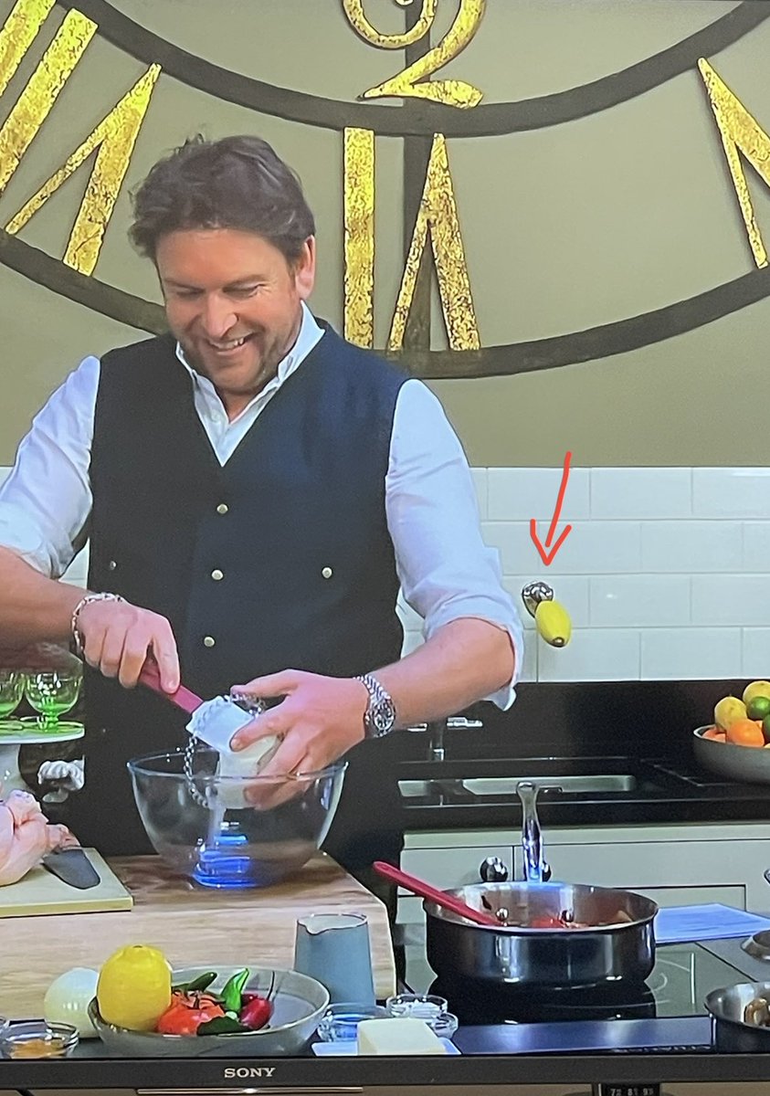 twisty80_'s tweet photo. @jamesmartinchef @sat_jamesmartin what is that on the wall… the heated discussions between me &amp; the hubby are driving us mad 😂 
I think it’s a lemon soap dispenser 🍋 🧼 🤷🏻‍♀️ Help a girl out…
#whatitisit #SaturdayMorning #jamesmartin #lemon https://t.co/P1H9ZpgKZJ