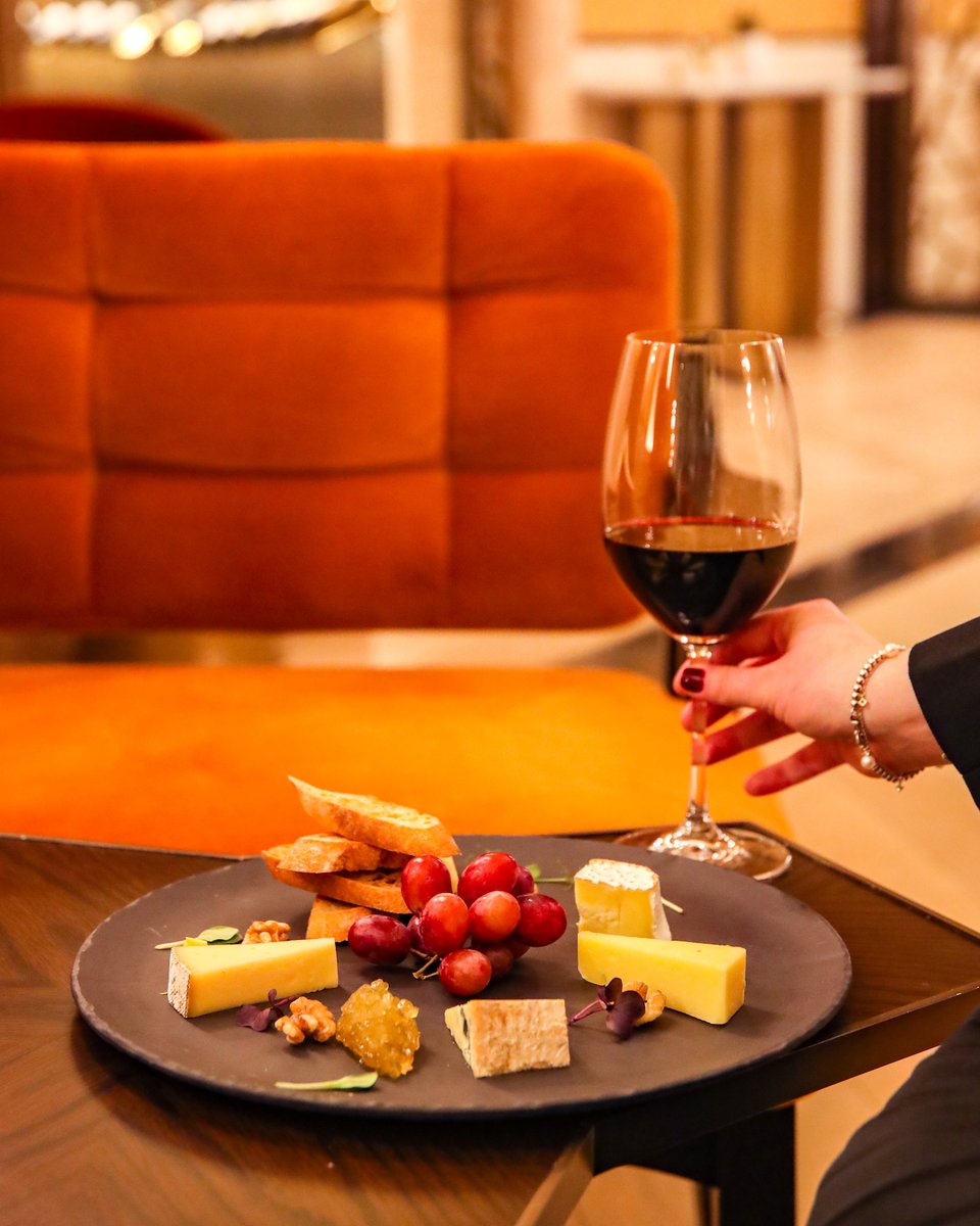StRegisDXBPalm's tweet photo. If you’re an enthusiast of savory flavors and exquisite red wine, then a charcuterie board of delicious cheeses is the way to complete the experience. #LiveExquisite https://t.co/tiykeVV7PD