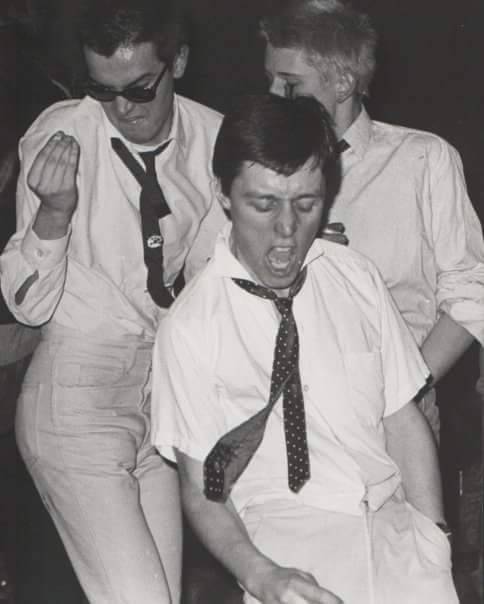 OTD 1977 The Jam play The Marquee supporting Bearded Lady & watched by Polydor's Chris Parry.  Annoyed at the hippy crowd, Paul Weller gets Shane MacGowan, Claudio Magnani & Adrian Thrills up on stage (📷s from the Nashville) Read Adrian's account: themarqueeclub.net/22-january-197… #TheJam