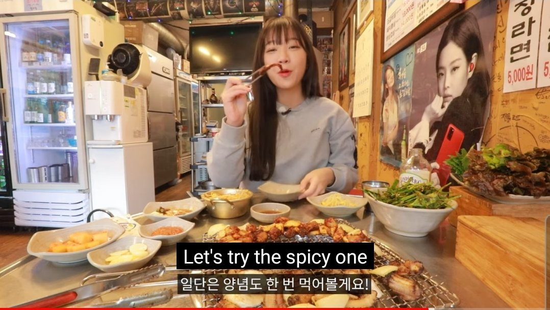 _encore_stage's tweet photo. I saw Jennie in Tzuyang's latest video.🤣  I was surprised because its her KTxSamsung poster on a restaurant! Her Soju posters were there too ofcourse. 

JENNIE RED really is ICONIC. 🤪 She needs to comeback @SamsungMobile https://t.co/zIhQIWOxTP