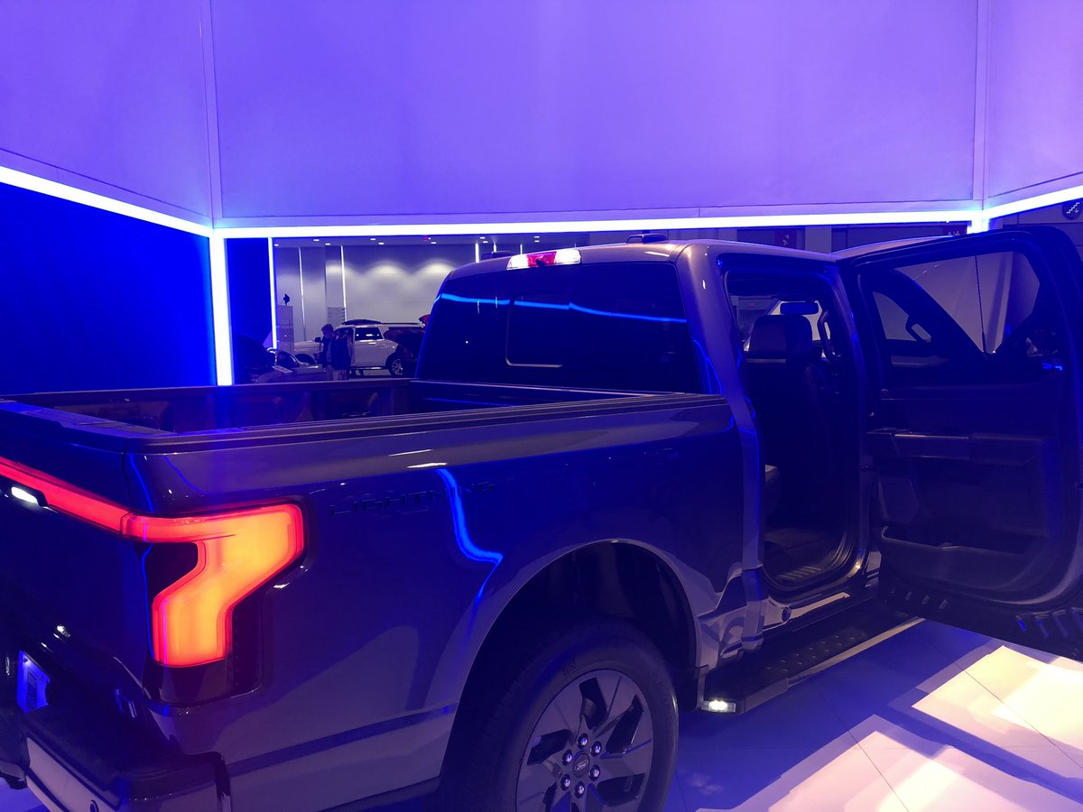 ev_advocate's tweet photo. Ford F-150 Lightning at the 2022 Washington Auto Show. Incredibly impressed that an EV of this size will start at just $40,000. Great looking truck! https://t.co/wO8SuVfby8