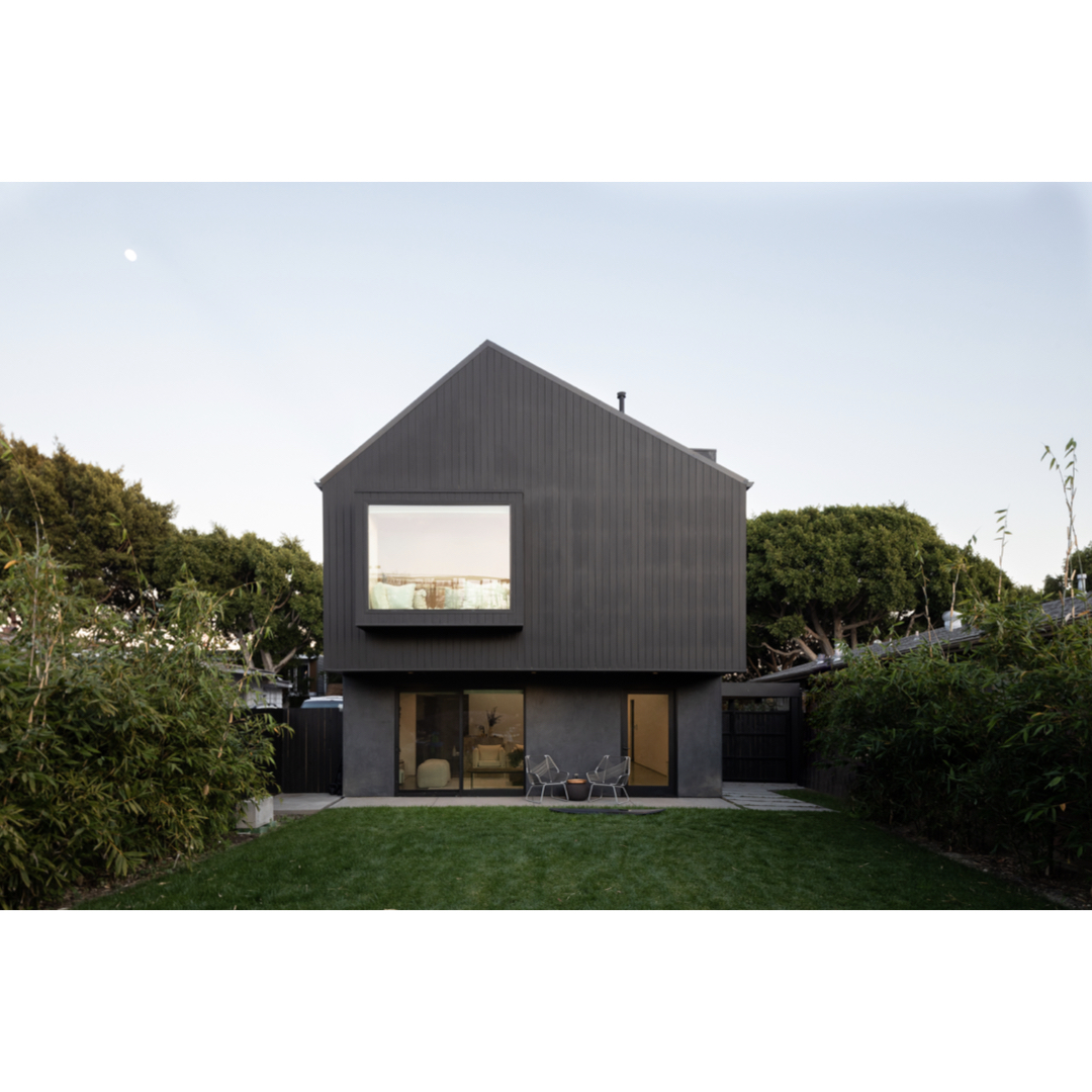 The silhouette is a powerful device within the language of form. As the daylight dims, the asymmetric gable darkens against the sky and the glass reading nook reflects the final moments of the evening's glow. 
#LaneyLAinc #architecture #architect #culvercity #ca #losangeles
