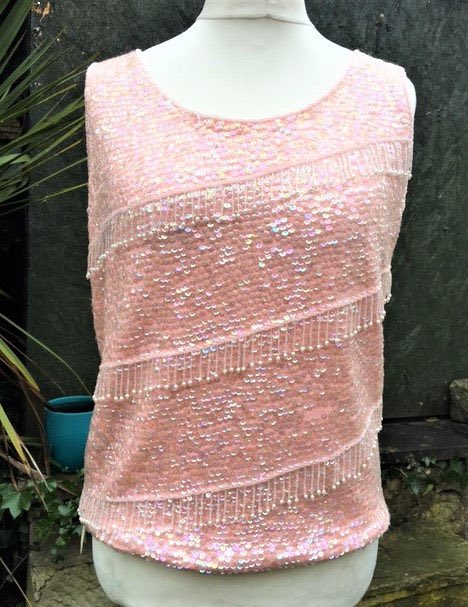 ginminvin's tweet photo. #etsy.com/uk/shop/GINGERMINTVINTAGE #1960's #Mod #Go-Go #Beaded #WoolTank https://t.co/vIoA7kVfIm Vintage Beaded Evening Top, Pearls, Beads and Sequined Top.Disco Top.Sparkly Pink Top https://t.co/QlE3My9ek6 https://t.co/turBARNdgU