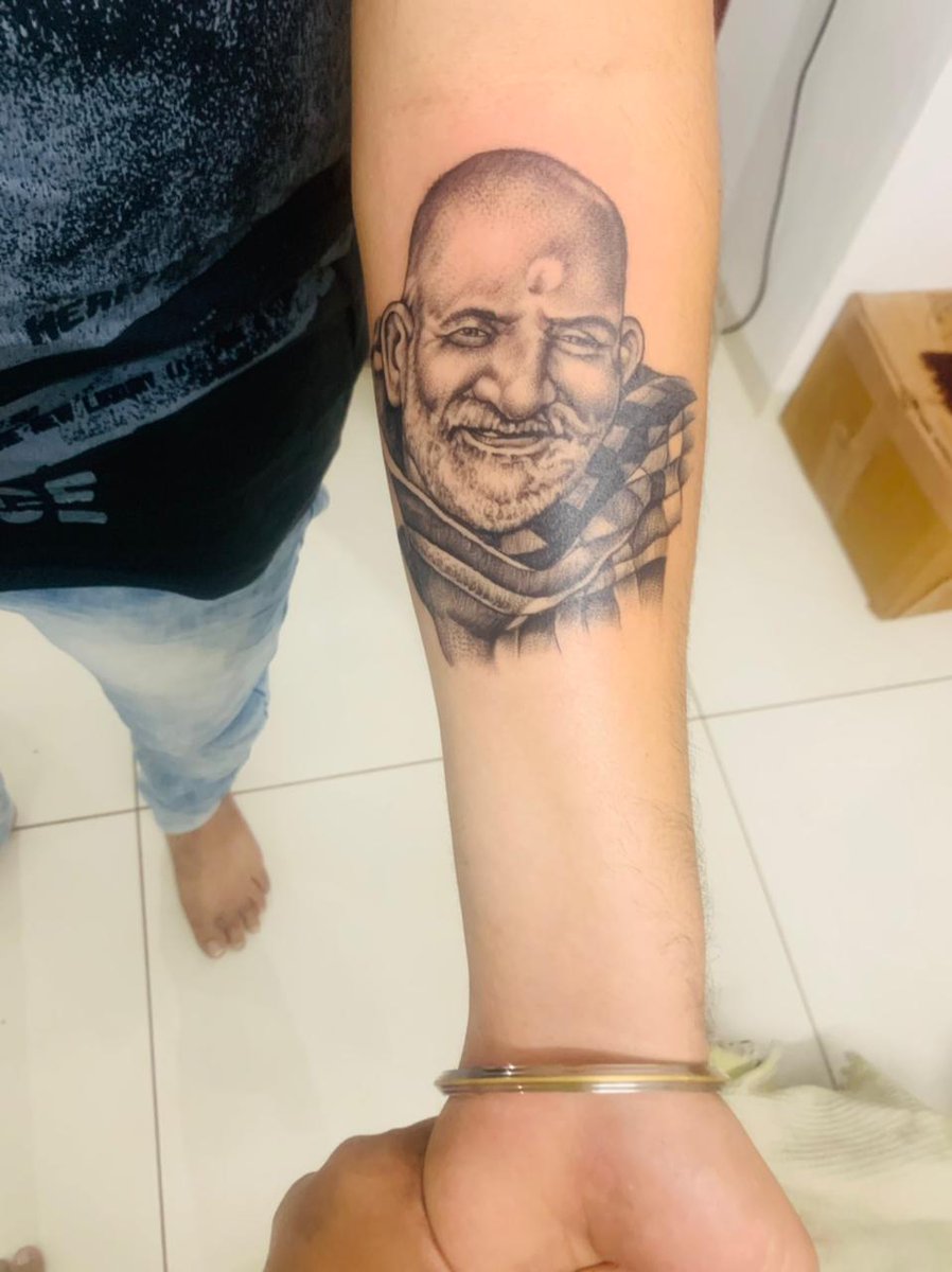 DharmikThakker7's tweet photo. That's the tattoo I have got 
My guru 
Neem karoli baba 🙏🏼

Does it look alike? https://t.co/qrn96WuGvU