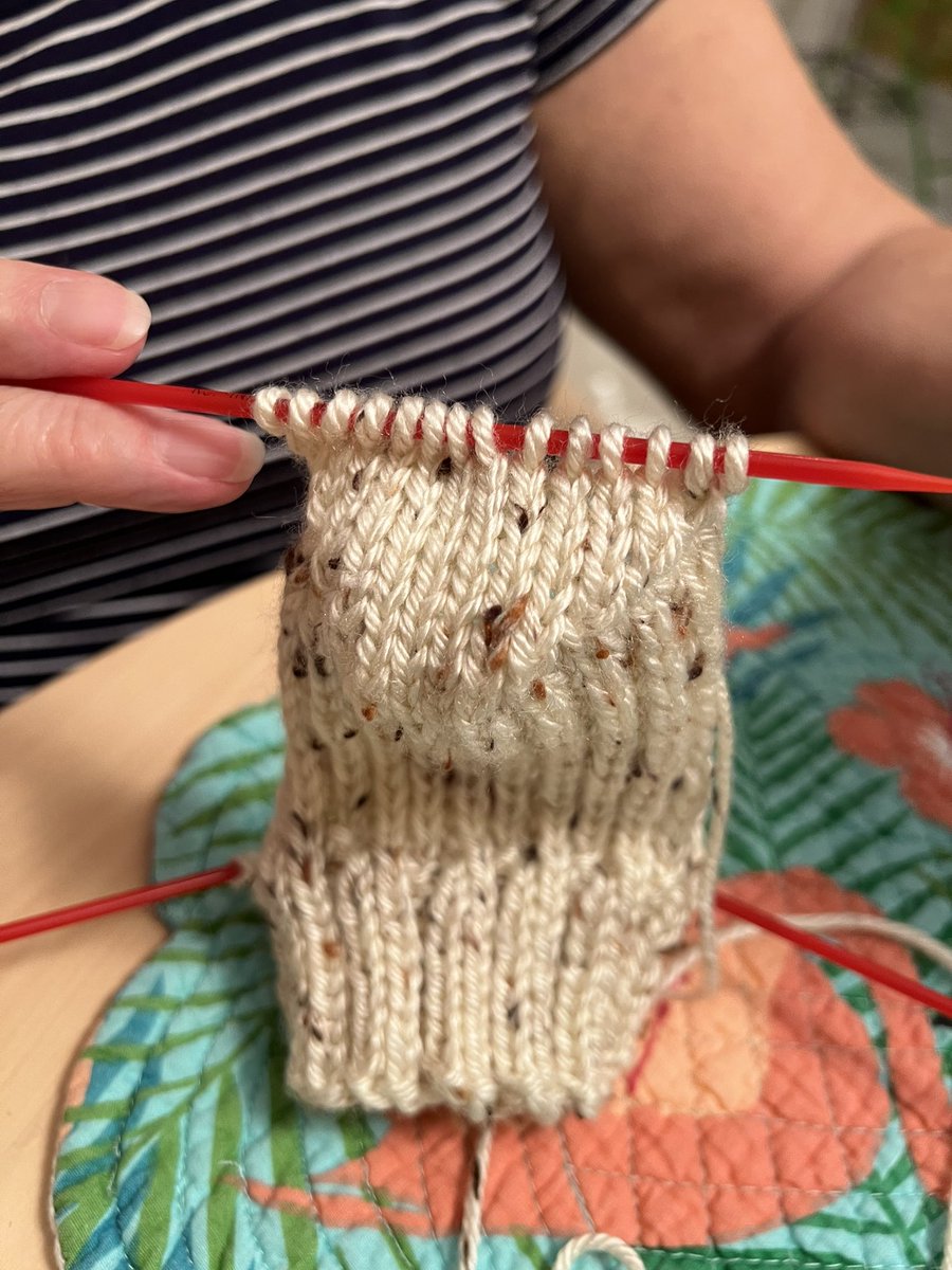 KnitHowell's tweet photo. Helping  Nancey #knit her first #sock in Florida. Turning that first heel is always so magical. Do you remember or is this going to be the year you learn to knit socks? #knitclass https://t.co/OdNKxG8bBf