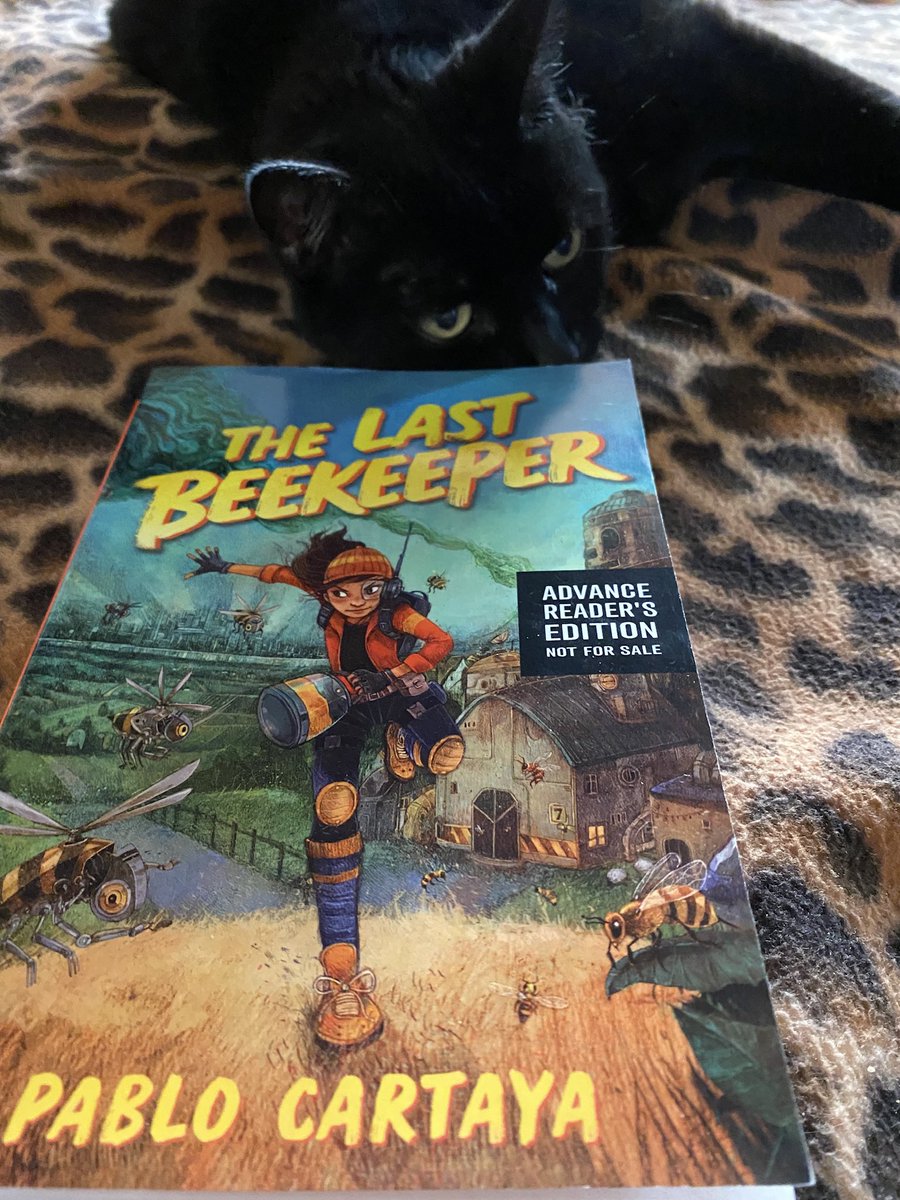 Next up is #TheLastBeekeeper by @phcartaya! I have only read the first chapter and I am already hooked! So is Olga 😻. It is having a very #dystopian feel so I hope that continues!! @HarperChildrens #bookposse