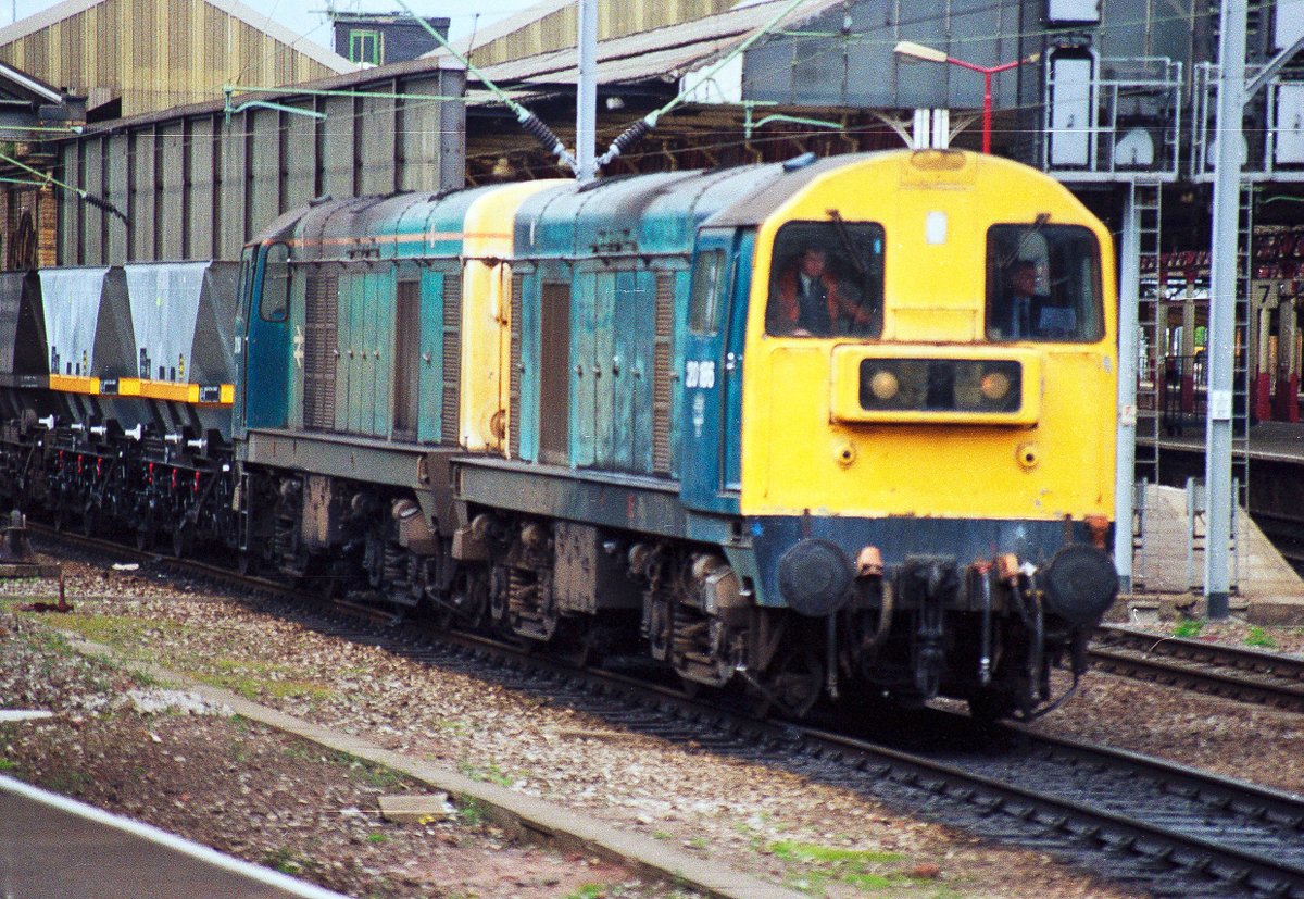 BR blue Class 20s 20166 and 20140 passing through Crewe with empty coal hoppers. 11/05/1991. #Class20 #Crewe