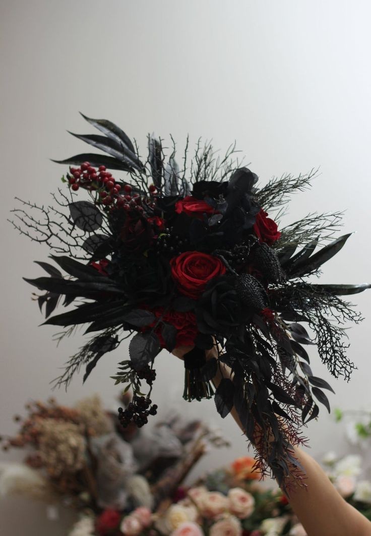 Sebastian steps in and sets down a beautiful bouquet of roses for the reaper humming softly as he steps behind her 

"Now why would you think your alone?" 

He then holds a box of chocolates in front of her