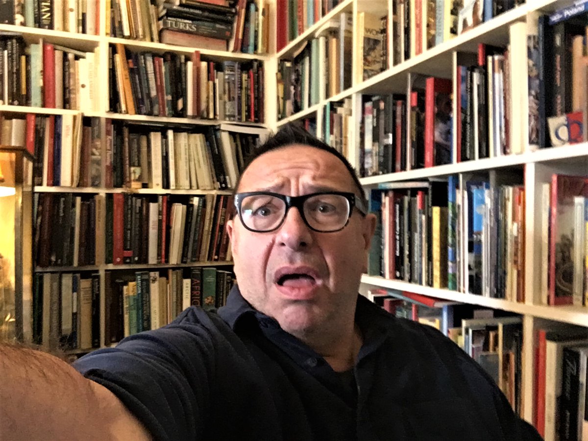 Nadine Dorries' shelves compared with my shelves.  She's Minister for Culture. I'm poor old Waldy. Where did it go wrong? 😥