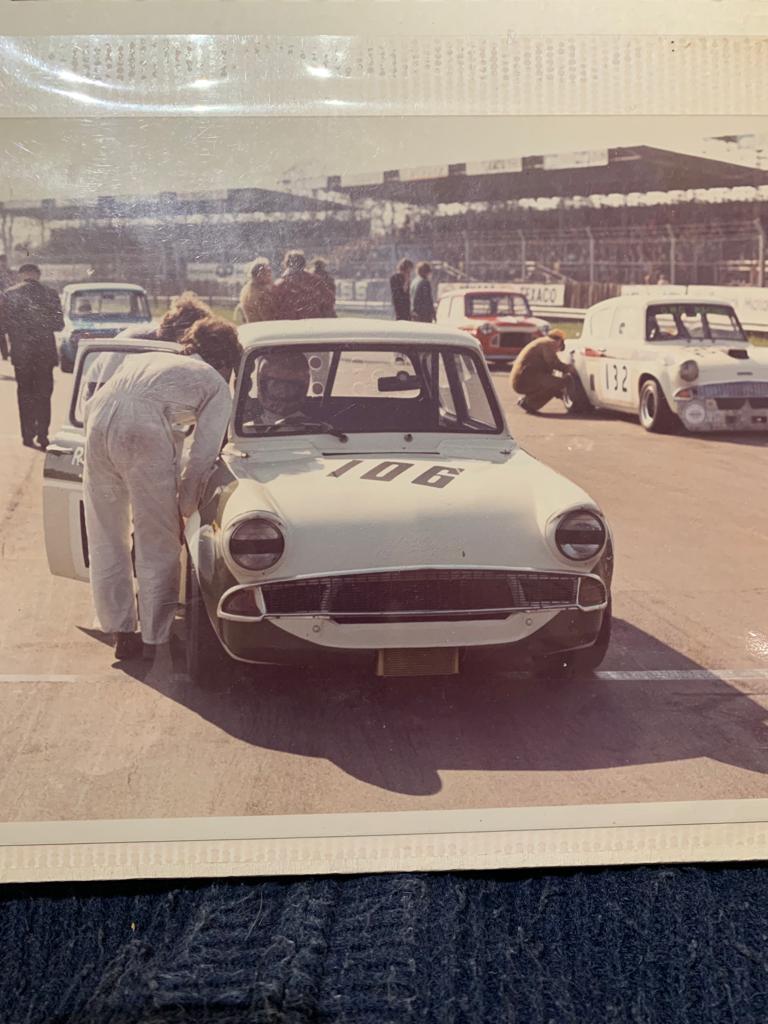 My Dads first race in 1973 at Silverstone in an Anglia Lotus 1600 Twin Cam. Notice the full grandstands, back when people went to watch club racing in the UK. When I race at Silverstone now there is no one in the grandstands .