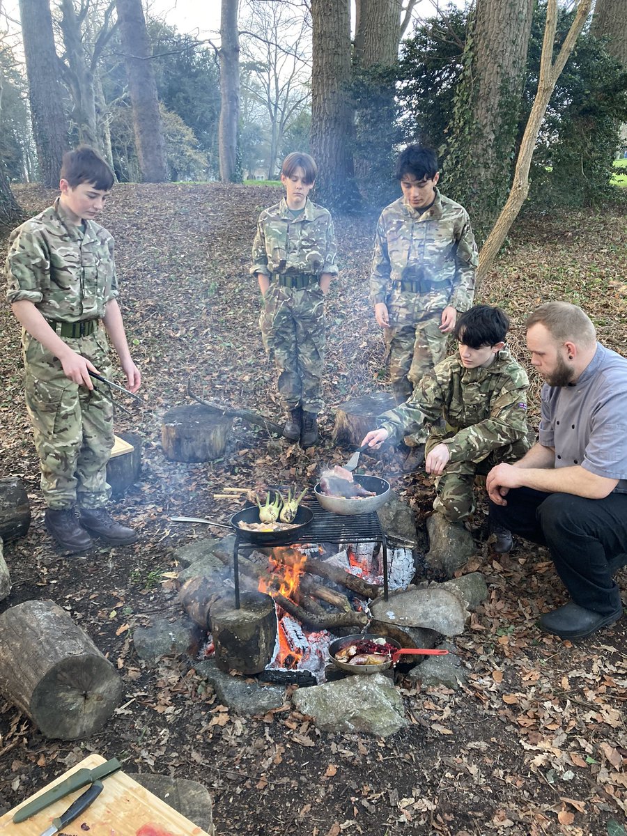 MillfieldBP's tweet photo. Great wild cooking lesson for the cadets from the Chartwells team. Pheasants and salted trout, baked and cooked on the open fire. @MillfieldSenior @MillfieldSport @MillfieldMAP @WelshGuards @CttHqsw @AlfordSjt @ChartwellsInd @NickDorber https://t.co/bVED9mUybX