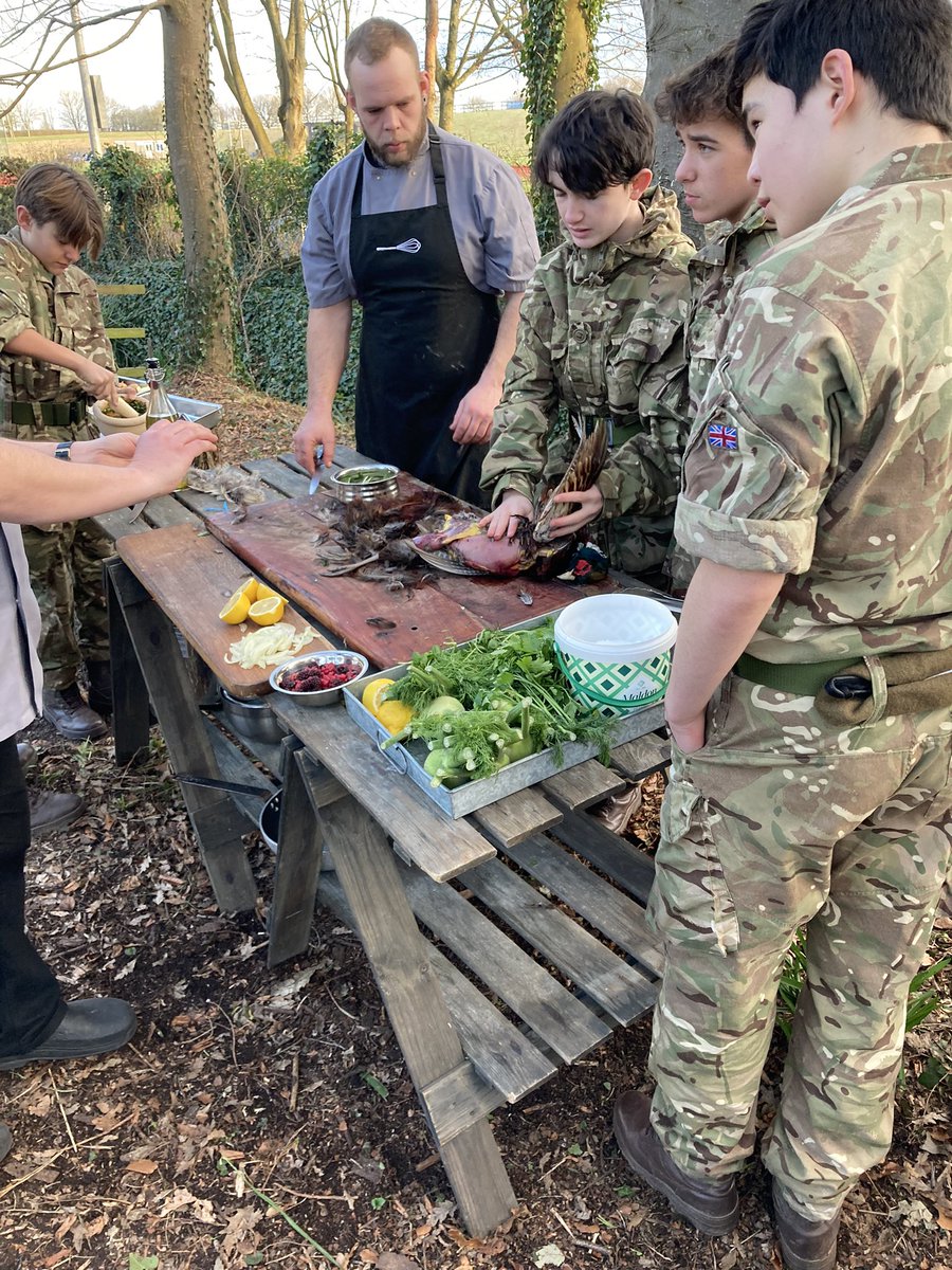 MillfieldBP's tweet photo. Great wild cooking lesson for the cadets from the Chartwells team. Pheasants and salted trout, baked and cooked on the open fire. @MillfieldSenior @MillfieldSport @MillfieldMAP @WelshGuards @CttHqsw @AlfordSjt @ChartwellsInd @NickDorber https://t.co/bVED9mUybX