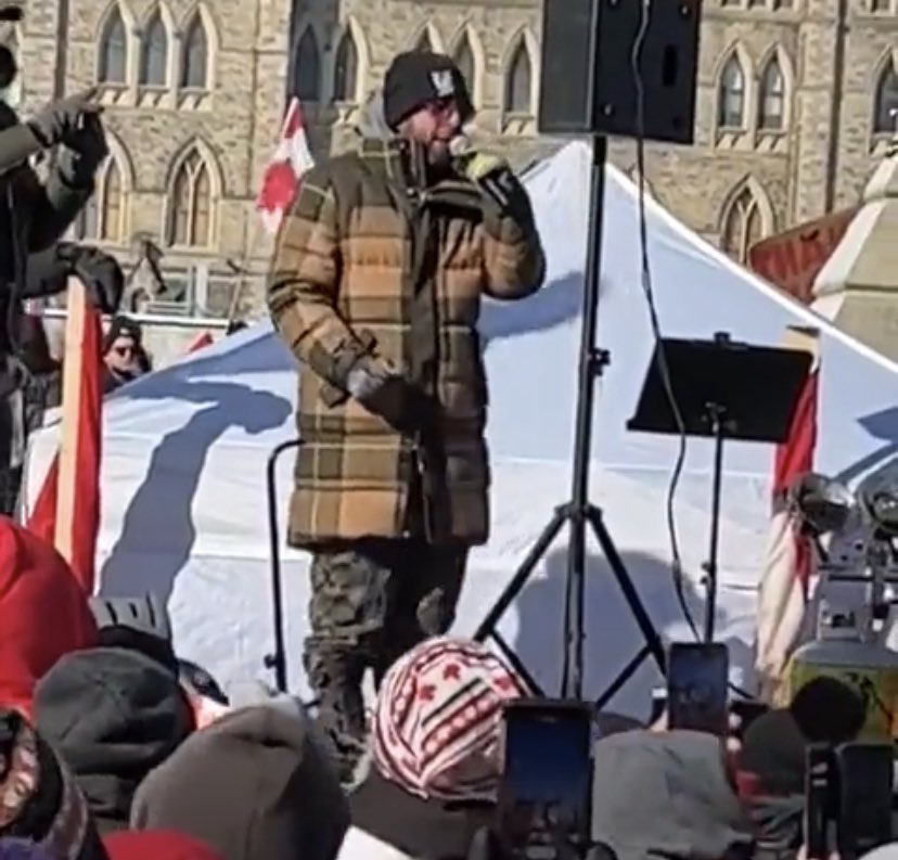 quintal_etienne's tweet photo. Holocaust denier Chris Sky gave a speech in front of the totally-not-hateful crowd that’s been occupying Ottawa for over a week, just in case anyone is tempted to say there’s ‘good people on both sides’ again. https://t.co/L4TYqHSf8H