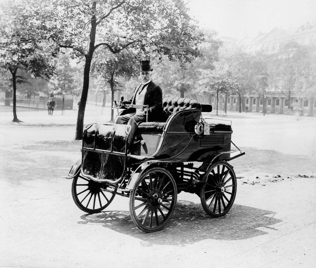 Roger Wallace drives his electric car. 1899.