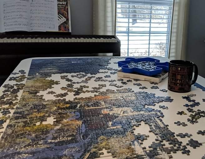 Snow Day (s) activities...I listened to This Is My America while working on this massive puzzle and learned a couple more songs on my piano
