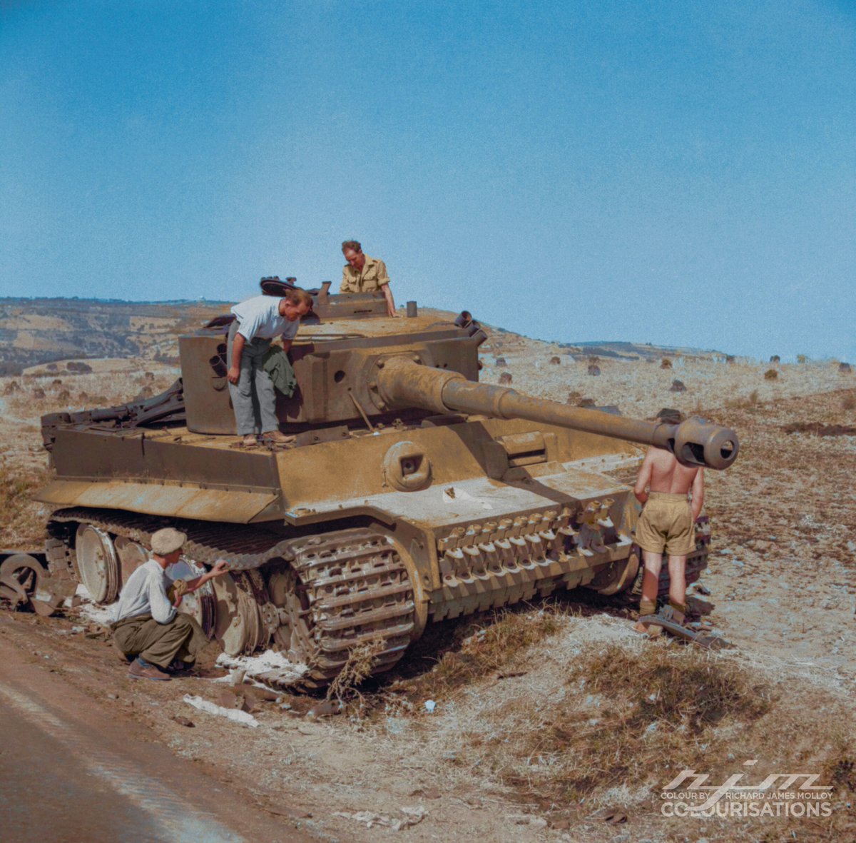 British troops and local civilians examine a knocked-out German PzKpfw VI Tiger tank, 19 July 1943. <a href="/ColourbyRJM/">ColourbyRJM</a>