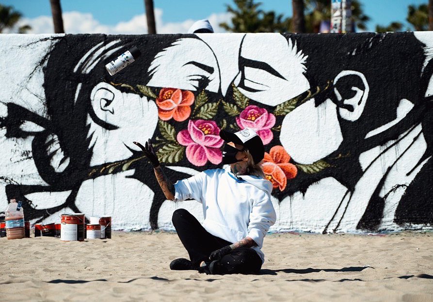 In the middle of March 2020,  "Stay Safe" were painted in Venice beach featuring a masked couple leaning in for a kiss, and it immediately went viral and become a voice of strength to Covid- 19 Pandemic.