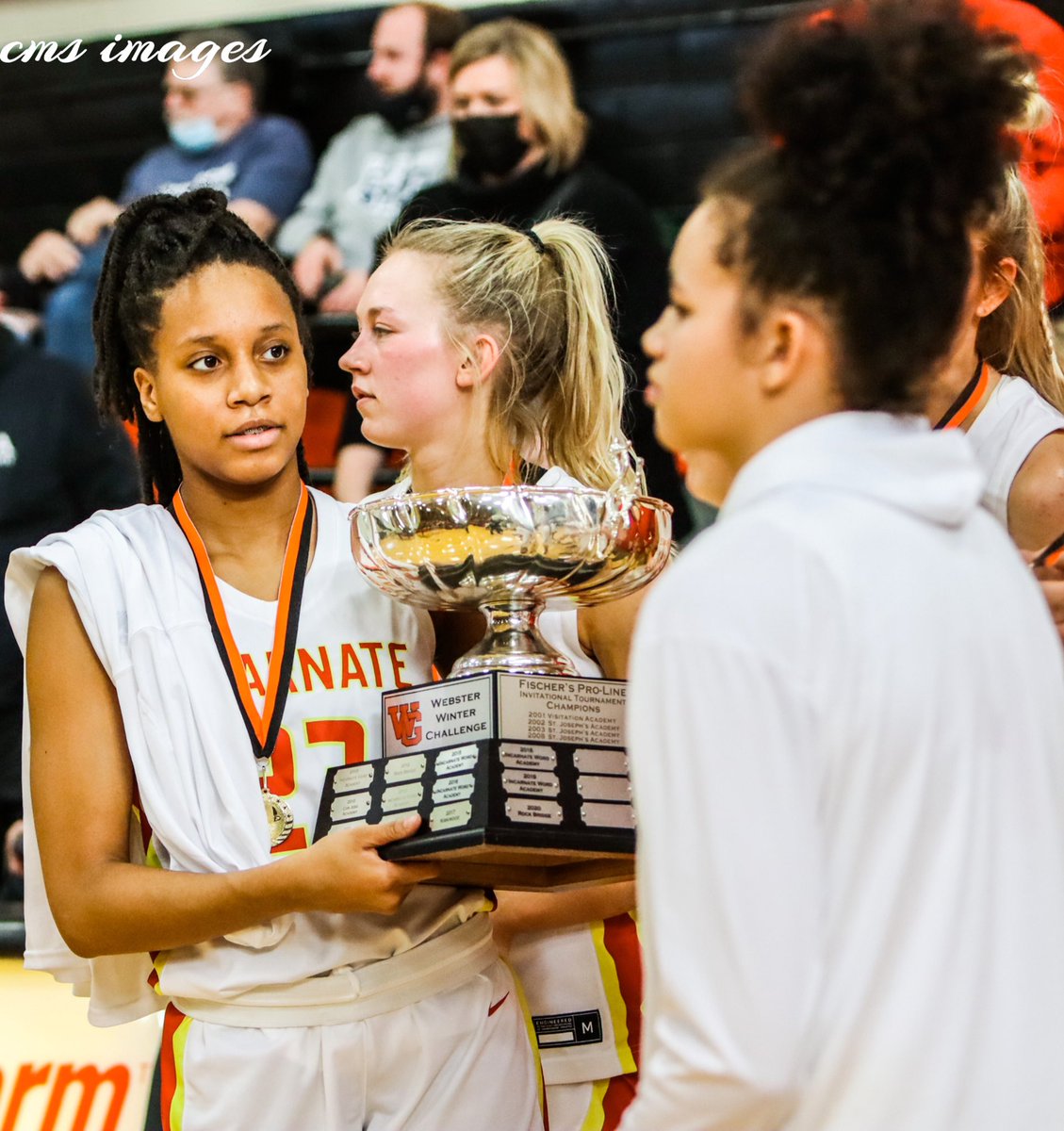 ChrisSchmitz168's tweet photo. “First of Many”
IWA freshman guard, Peyton Hill (23) cradles the silver cup championship trophy of the Webster Winter Challenge in a post game ceremony! @iwa_hoops @iwaredknights @Athletics_IWA @GSV_STL @stlprepsports1 @PrepHoopsMO #championshipsunday #stlprephoops #cmsimages📸 https://t.co/p6Uy9ahBQ4