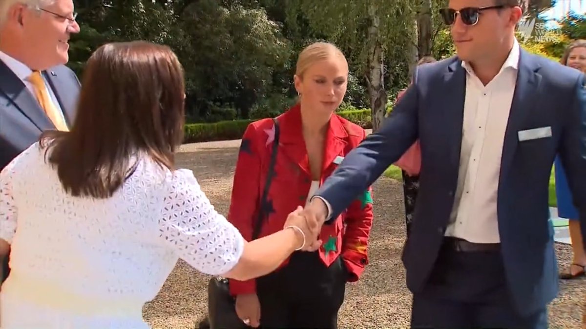 SaraJade_13's tweet photo. Then there was #JenMorrison BL Standing arms behind her back to her ‘subordinates.’ Doesn’t want physical contact.Shakes fiancé‘s hand FIRST, left hand kept behind her back hides true emotions. #GraceTame unresponsive. Jen shows expression of disgust like there’s a bad smell. https://t.co/RMVFaZBEV7