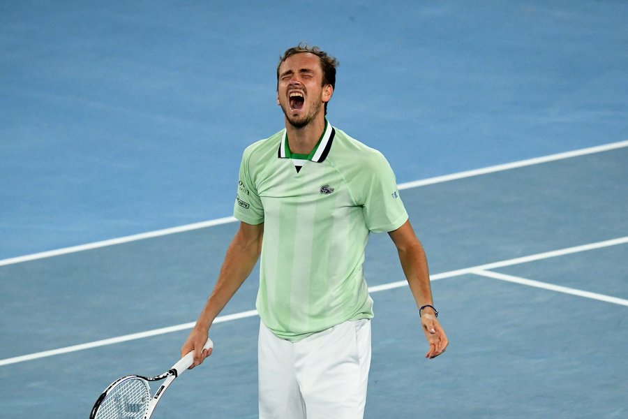 Russia's Daniil Medvedev reacts after winning a game against Canada's Felix Auger-Aliassime during their men's singles quarter-final match on day ten of the Australian Open tennis tournament in Melbourne.