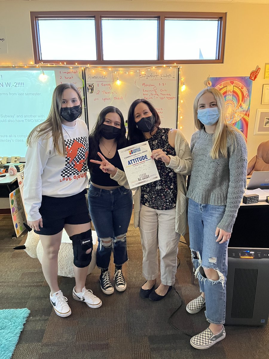 Character Matters - Halle, Kelsey, &amp; Marissa presenting Ms. Wenz with the "Attitude" award.  Girls Basketball thanks her for making a difference in their classroom.
