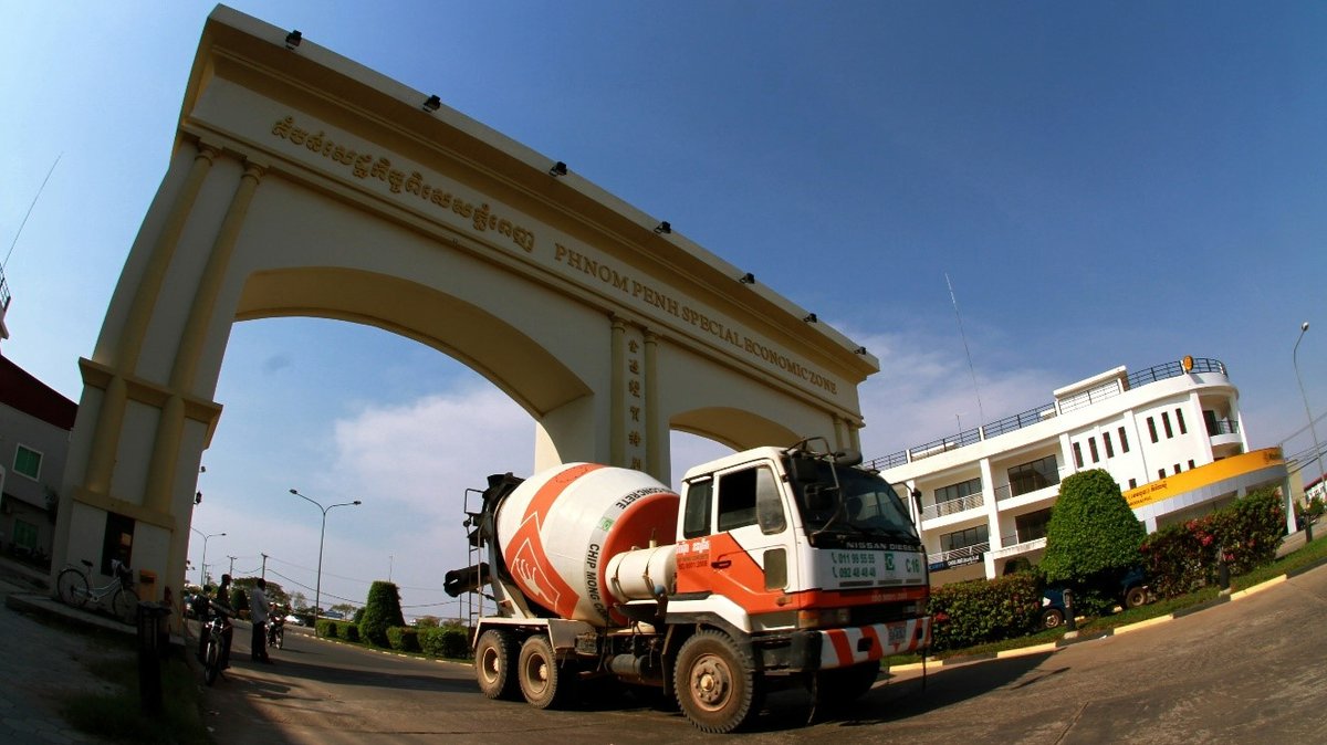 A cement truck outside the Khan Posenchey Special Economic Zone in Phnom Penh, Cambodia, which houses fashion, food, electronic products and more for local and regional consumption.