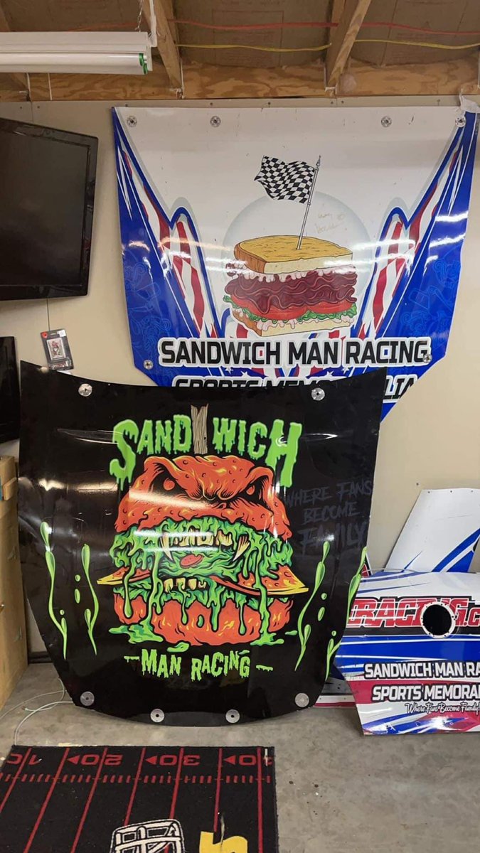 @sandwichman2020 has his 2 #sandwichmanracing hoods safely and rightfully in his shop. Can’t wait for this years sick #sandwichmanracing paint schemes!