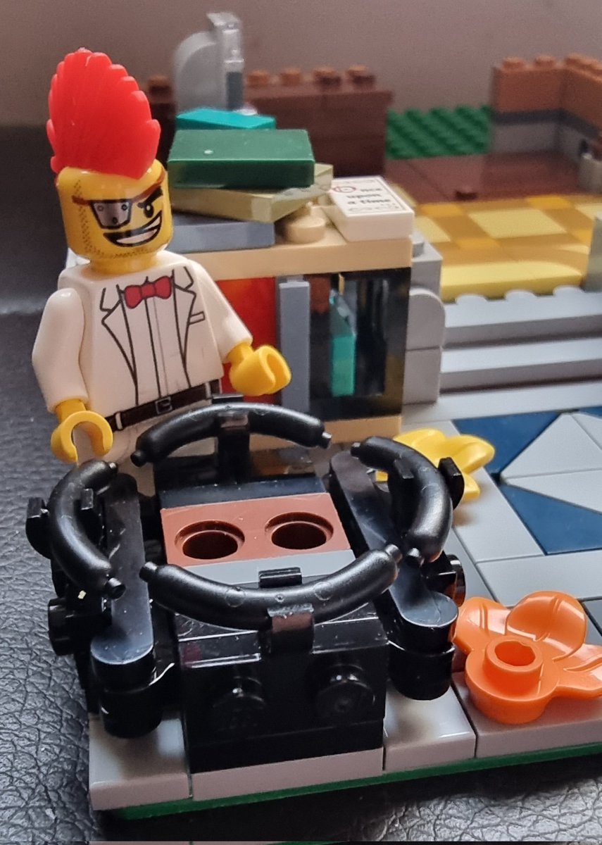 plymcaire's tweet photo. I arrive back on Anchorage Street following a telegram from Blaize. They have a friend called Paul who wants to start a new business but lacks the premises. Which is where my building expertise comes in... I've made a start already, though this is sitting out front... 🤷‍♂️ #Lego https://t.co/PSv35An9l1