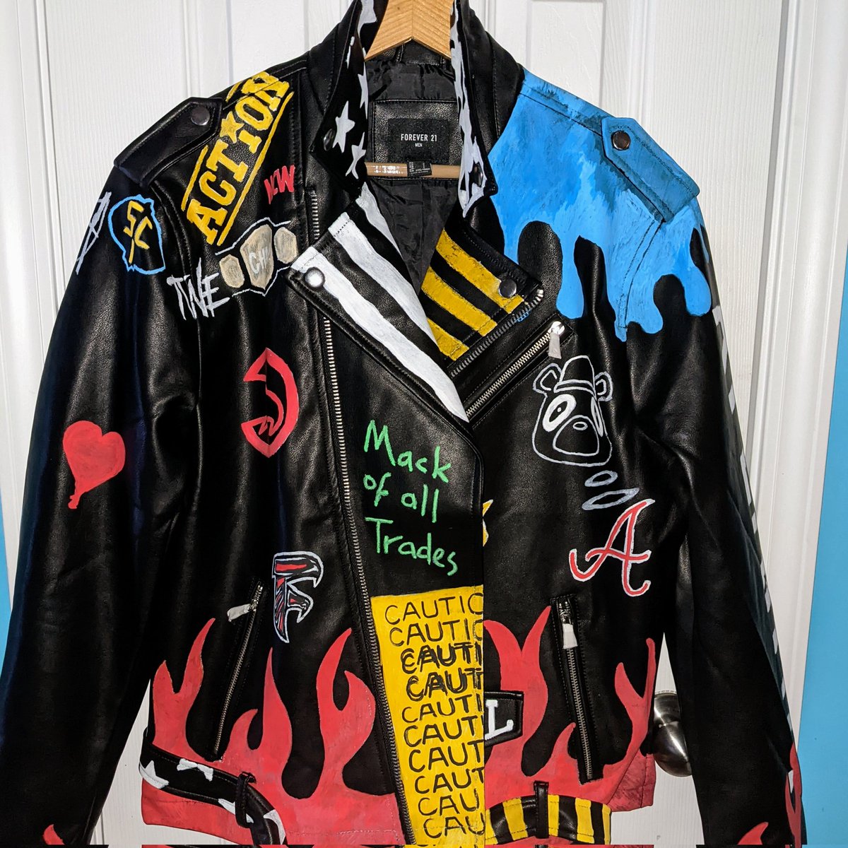 blountymcfly's tweet photo. I've known @AC_Mack for a few years now &amp; as much as we've talked about wrestling, we've also talked the same amount, if not more, about music, fashion and especially Kanye!

So with this jacket of course there's a whole bunch of Kanye references on it. See em all here! https://t.co/s081xIj6Vw