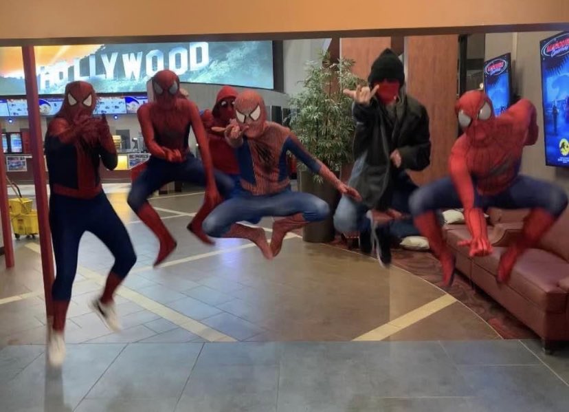 TeamDakota2's tweet photo. @ComicBook My nephew and his friends at the premiere, they all wore different suits. My nephew is the one in the front middle. https://t.co/Gjp4okStXS