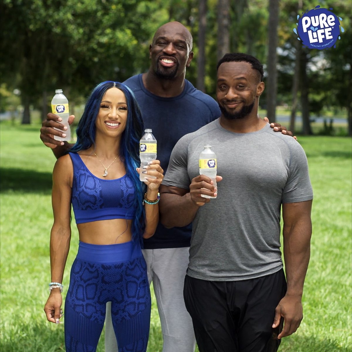 We love to see <a href="/WWE/">WWE</a> Superstars @titusoneilwwe, @sashabankswwe &amp; @wwebige with our new look! Have you spotted it in stores yet? #PureLife #DrinkPureLife
