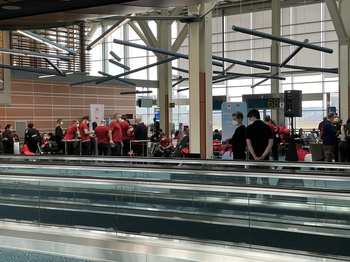 rfilippone's tweet photo. Team Canada waiting to board in a gate that closed to the public - everyone on the chartered flight today had an extra covid test this morning #Olympics https://t.co/RLzQ33QBuo
