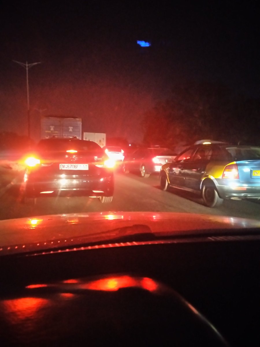s_affram's tweet photo. @benkoku @KojoAB   This is Dawhenya Prampram road as at 11:11pm. I have close from work at 5pm and had to hide in Tema till 10pm just to avoid the usual traffic but it still got me. Am stucked in there now. https://t.co/7ZcgS3sJ9h