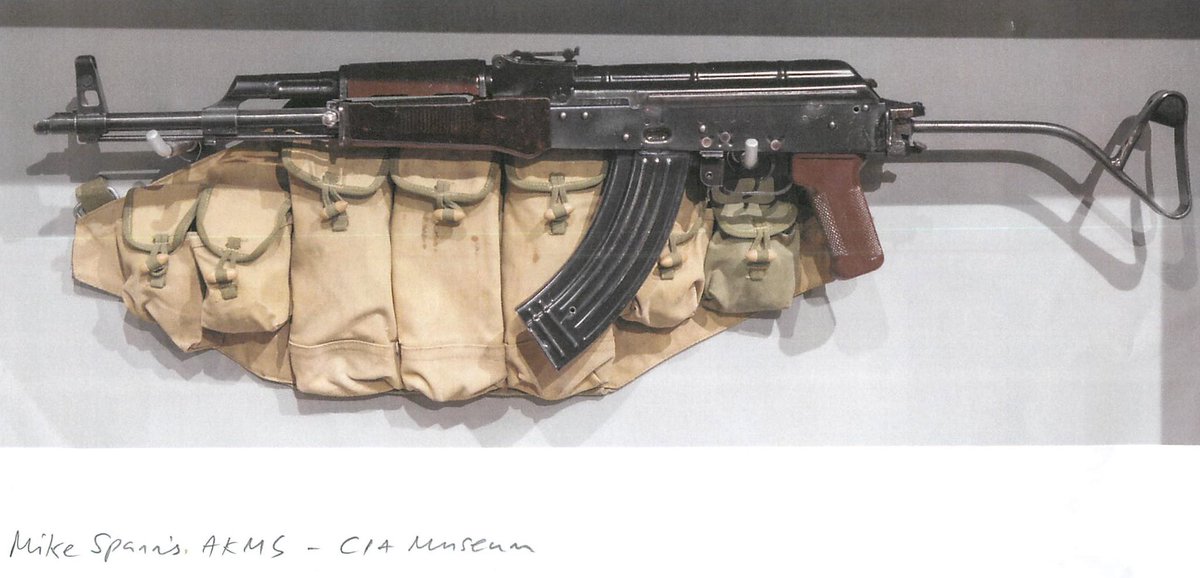 tobyharnden's tweet photo. This is East German AKMS rifle &amp; chest rig CIA’s Mike Spann took into Afghanistan. Now in @CIA Museum. In last moments of his life he used rifle to shoot 2-3 Al-Qaeda prisoners rushing him. Rest of 30-round magazine was expended by comrade David Tyson (First Casualty p 191-97) https://t.co/xpOhwi5IEB