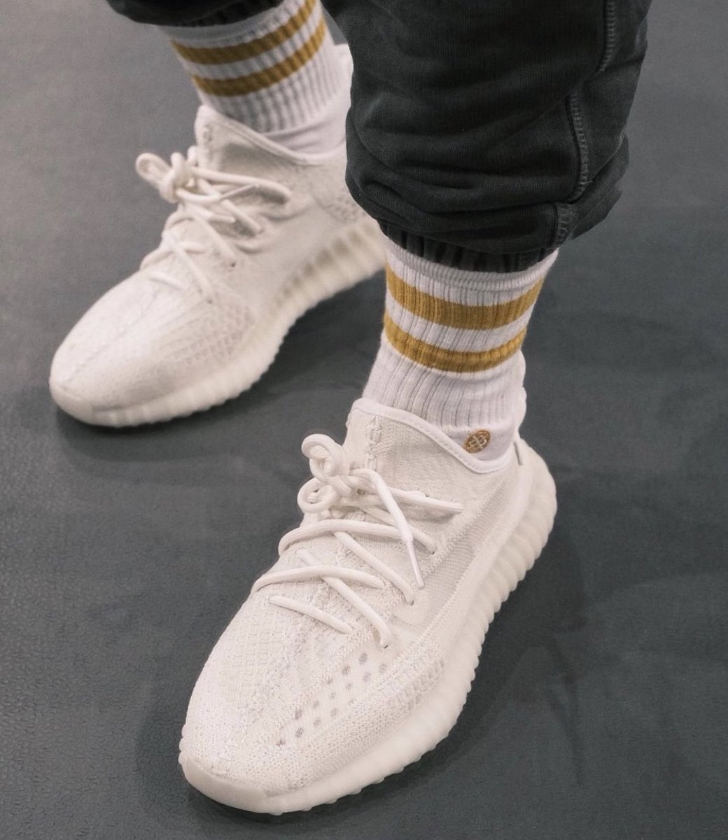 all white yeezys on feet