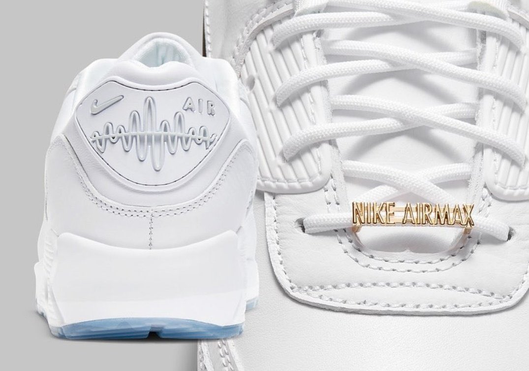 orange and white nike football cleats