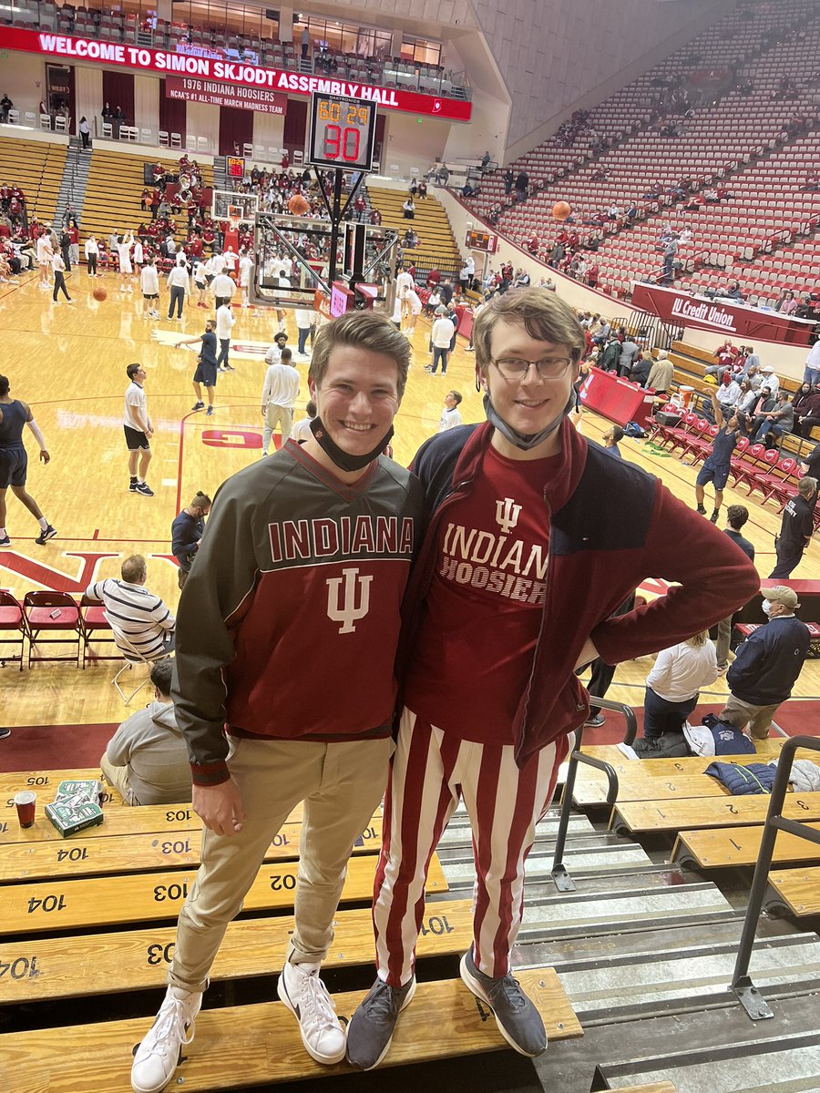 HoosierProject's tweet photo. Ben is rocking his Coach Woodson goatee mask and candy stripes for his first college basketball game ever with his brother Spencer. Cheer loud behind the basket guys! #iubb #HoosierTicketProject https://t.co/hVaXRu9fAy