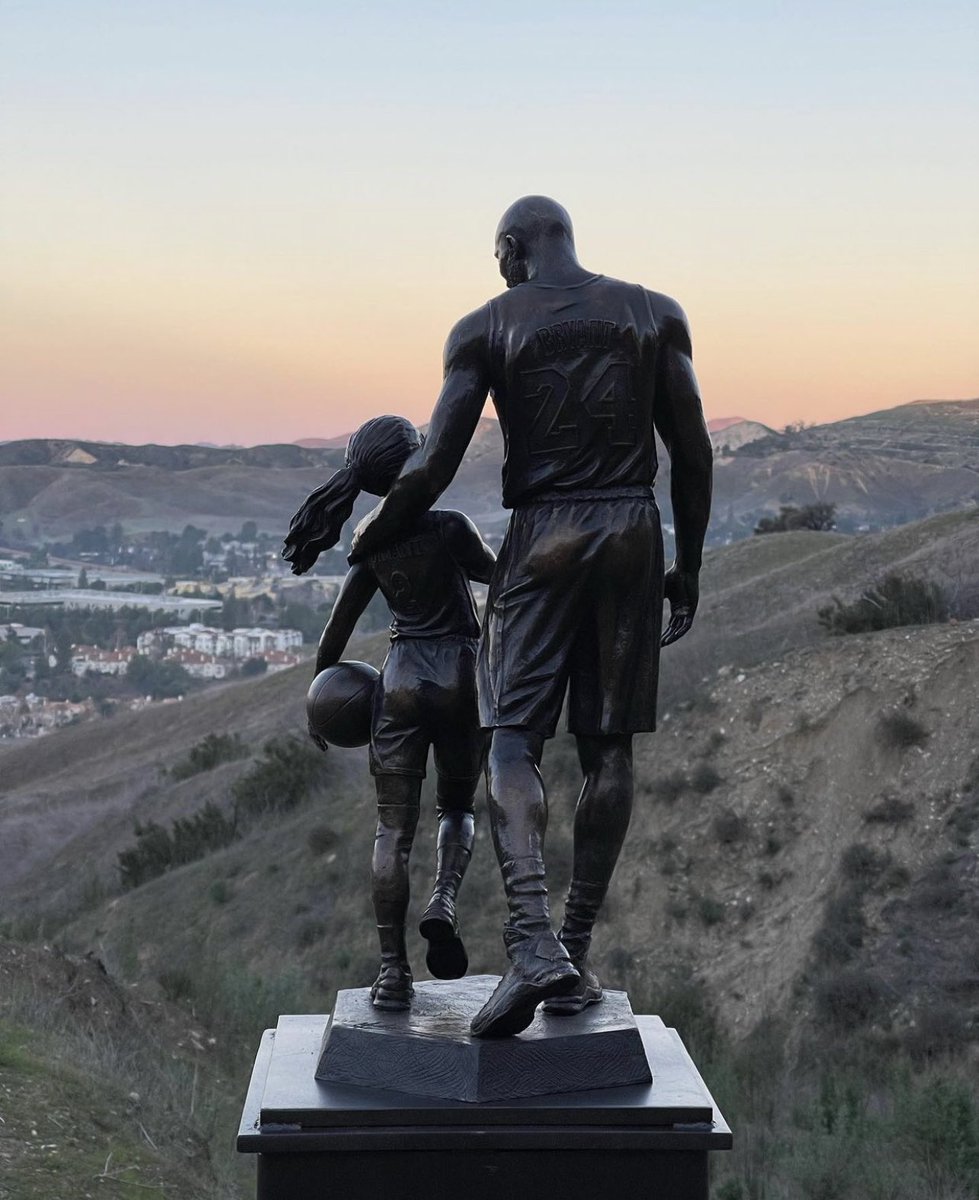 LADEig's tweet photo. A sculpture of Kobe and Gigi Bryant was placed at the site where they tragically passed away exactly 2 years ago today 🙏💜 https://t.co/PR5dL0CNJe
