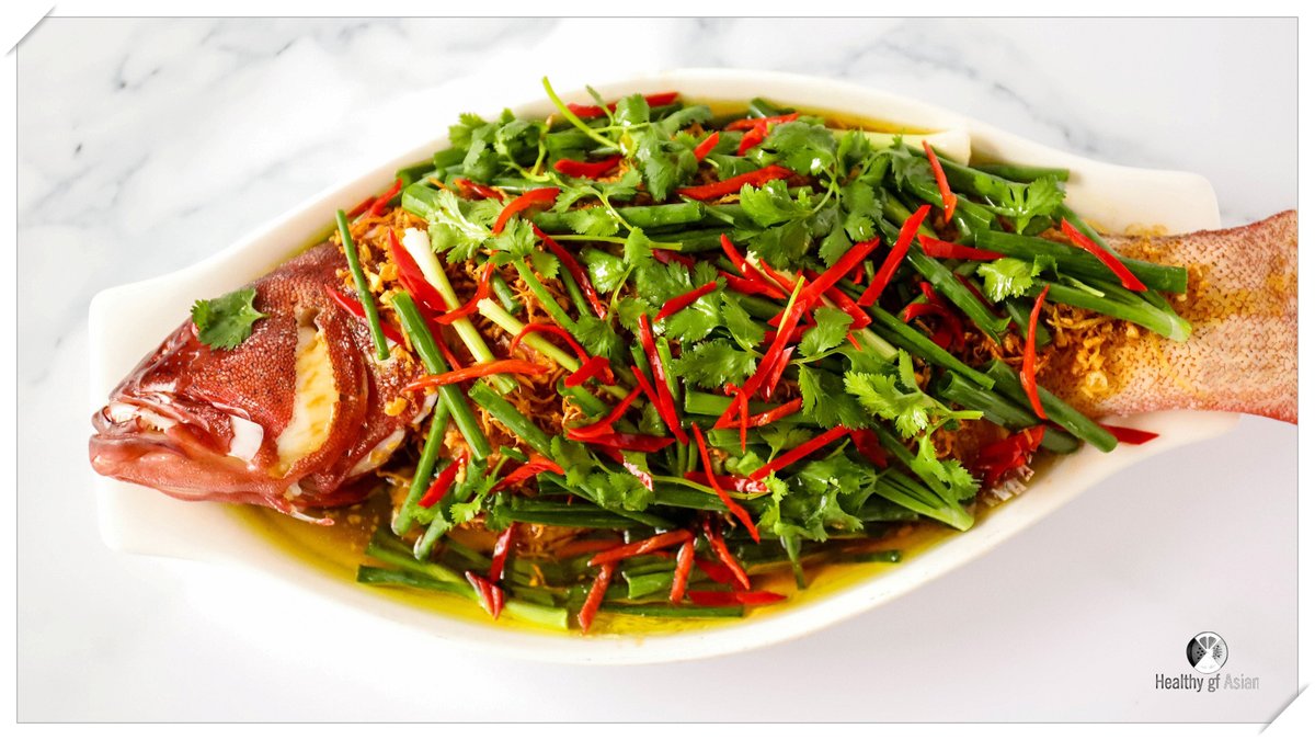#ChineseSteamedWholeFish with Ginger Shallot is the most classic and celebrated Cantonese seafood dish. Simple &amp; full of flavor.#ChineseRecipe #glutenfree #FishRecipe #SteamedWholeFish #glutenfreerecipes #ChineseNewYear2022 #glutenfreefood  healthygfasian.com/chinese-steame…