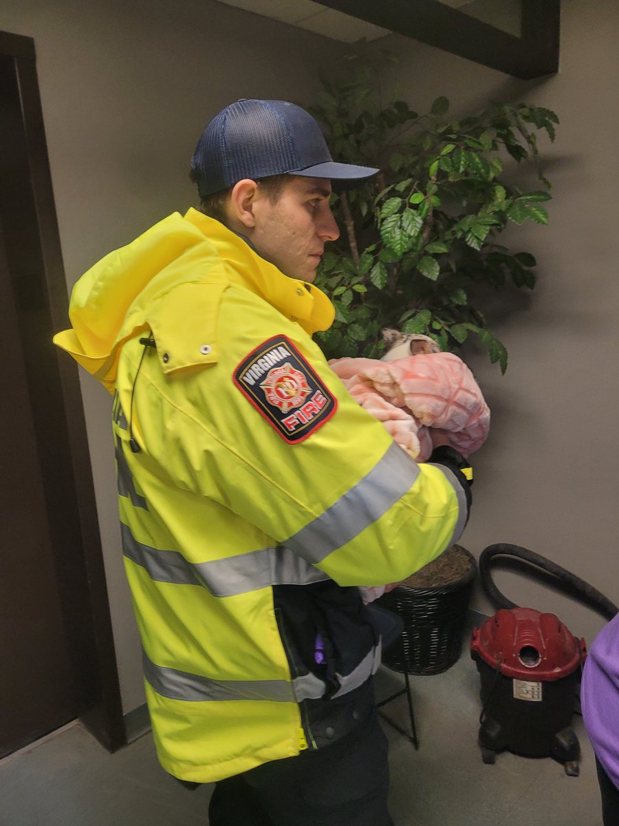 VFD's EMT Colton Anderson holds a small dog for a resident during the evacuation of all 147 residents from the Columbia and Richelieu Apartments who have been successfully relocated. This includes pets. Thank you to all our mutual aid partners who supported this effort.